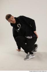 Man Adult Athletic White Kneeling poses Sportswear Dance